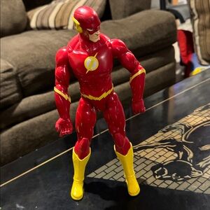 Red and Yellow Action Figure